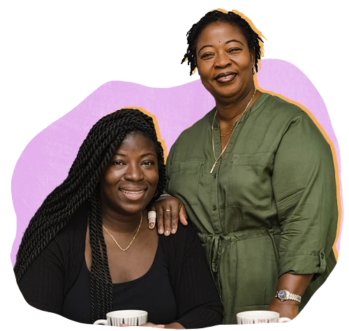 Two Black women smiling